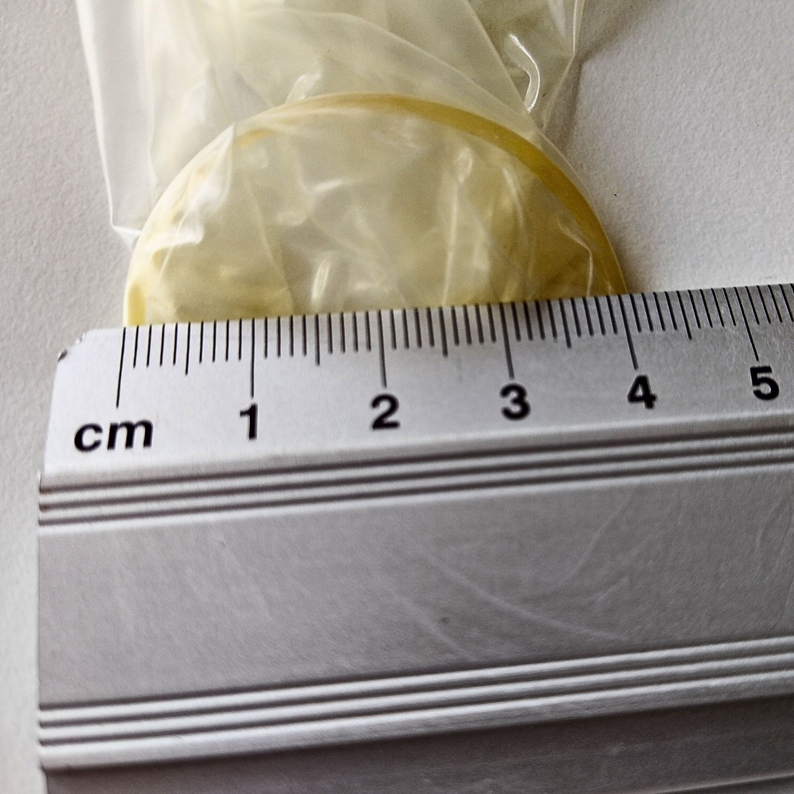 De diameter van een condoom meten