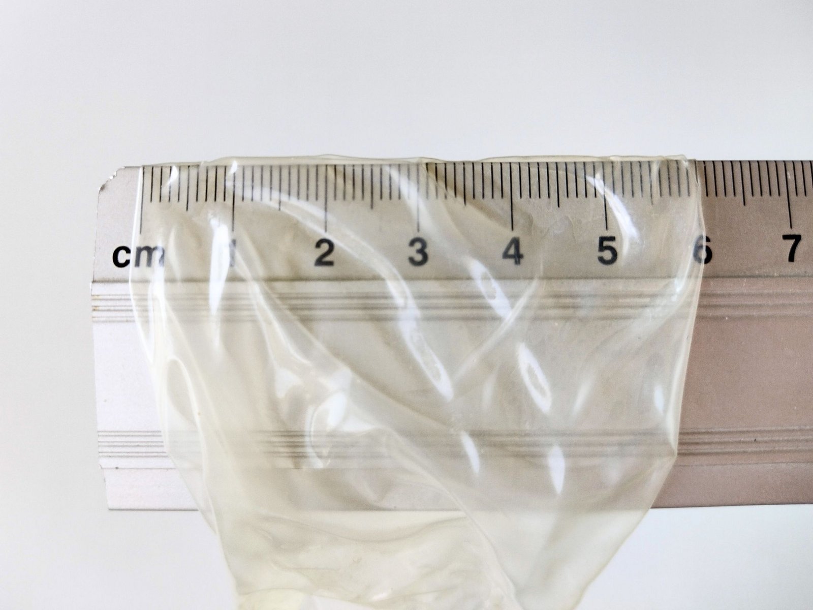 Nominale breedte van een condoom gemeten met een liniaal